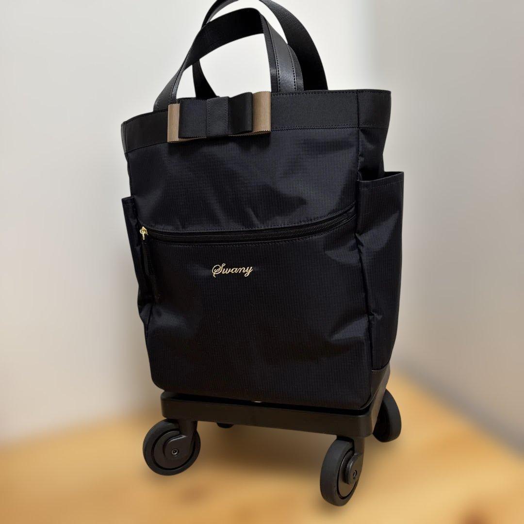 値下げ‼️人気ブランド‼️SWANY‼️スワニー4輪キャリーバック（レインカバー付き）