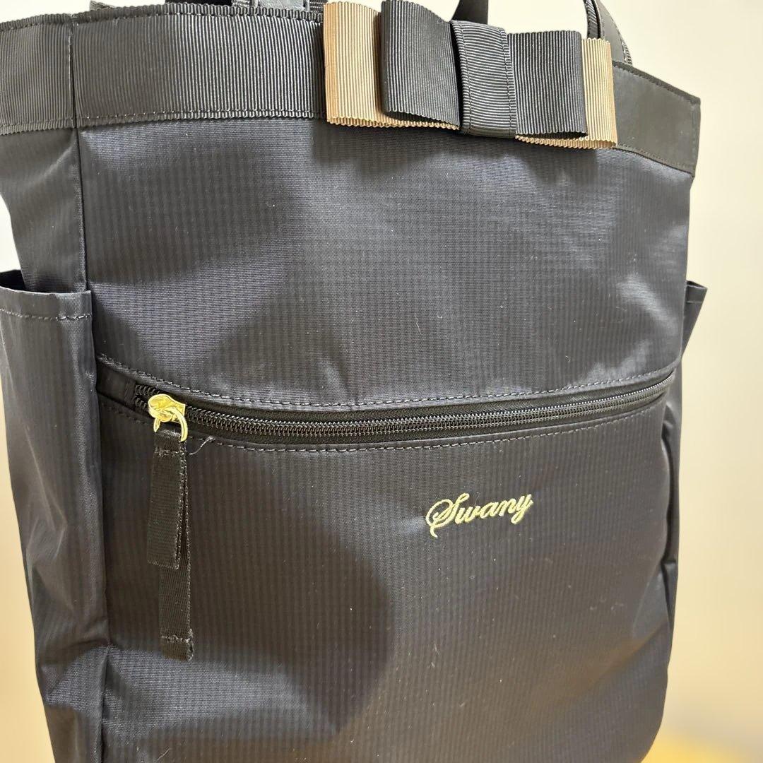 値下げ‼️人気ブランド‼️SWANY‼️スワニー4輪キャリーバック（レインカバー付き）