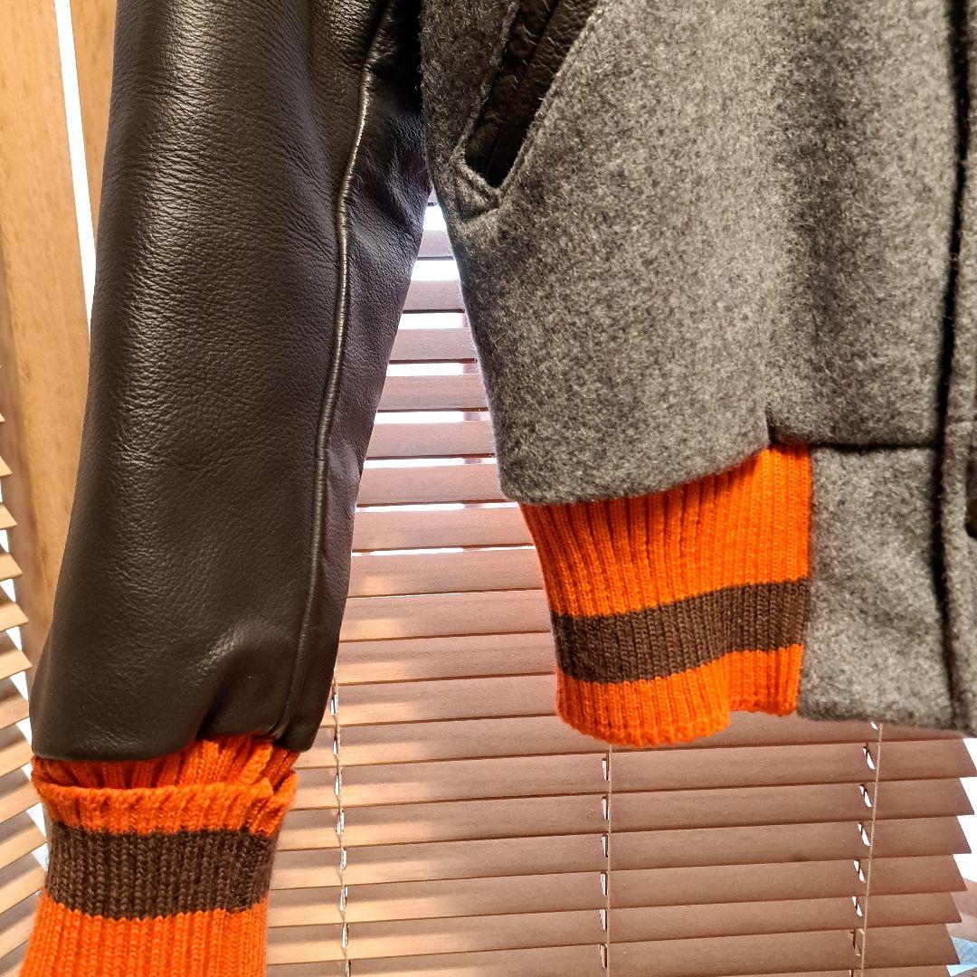 スクーカム　スタジャン　メルトン　オレンジ