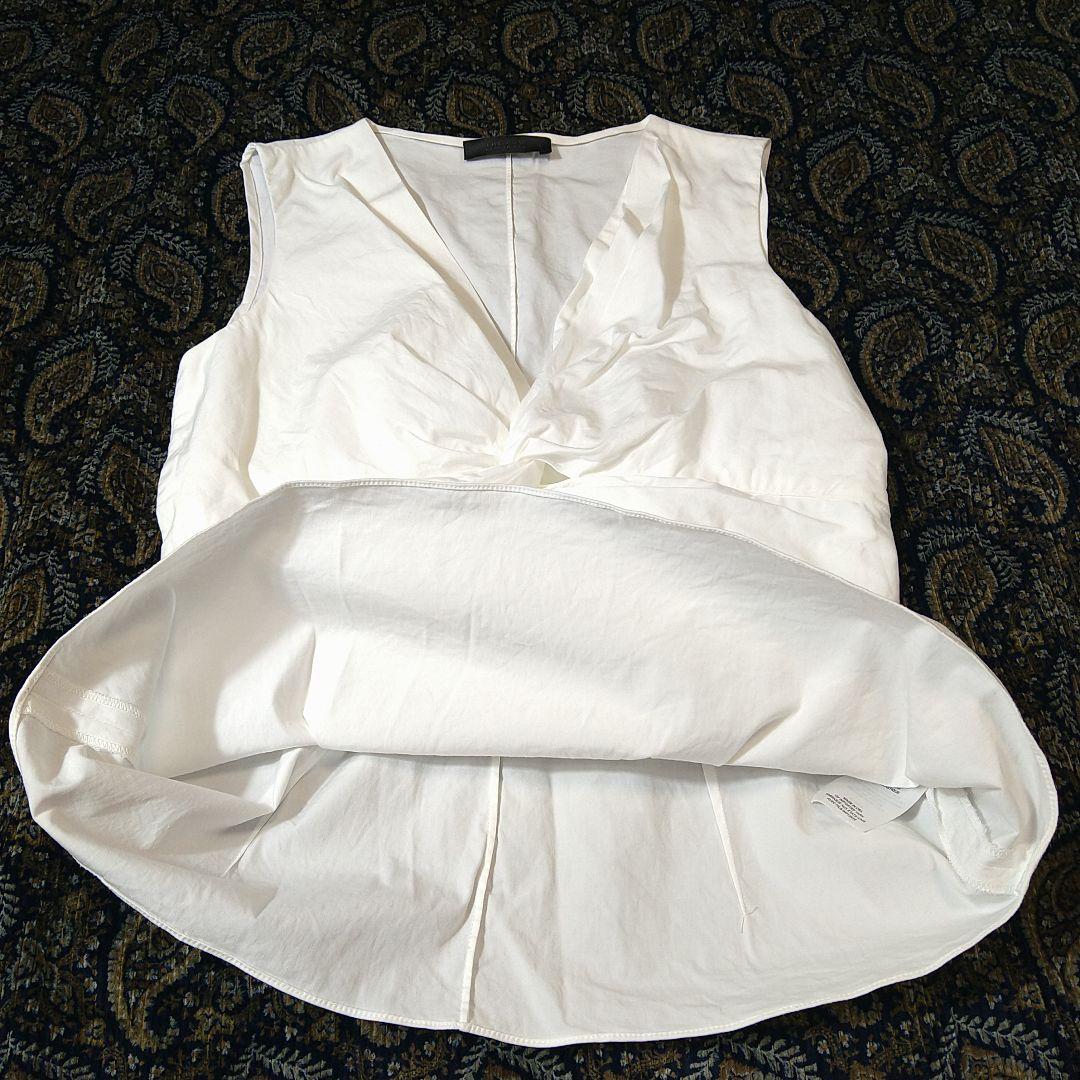 ホワイト ノースリーブ チュニック ツイストデザイン