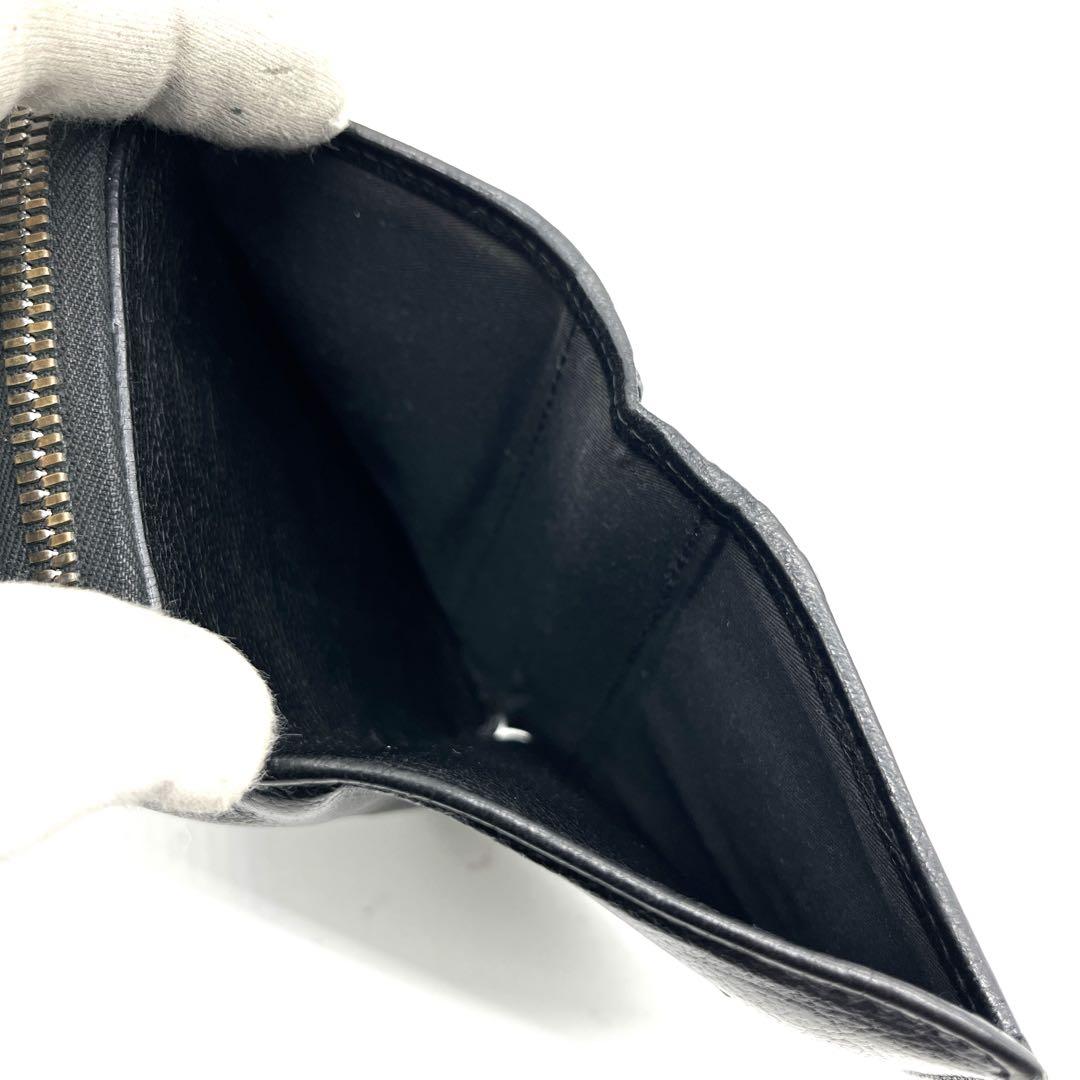 イルビゾンテ 二つ折り財布 ブラック レザー シボ 金ボタン ラウンドジップ