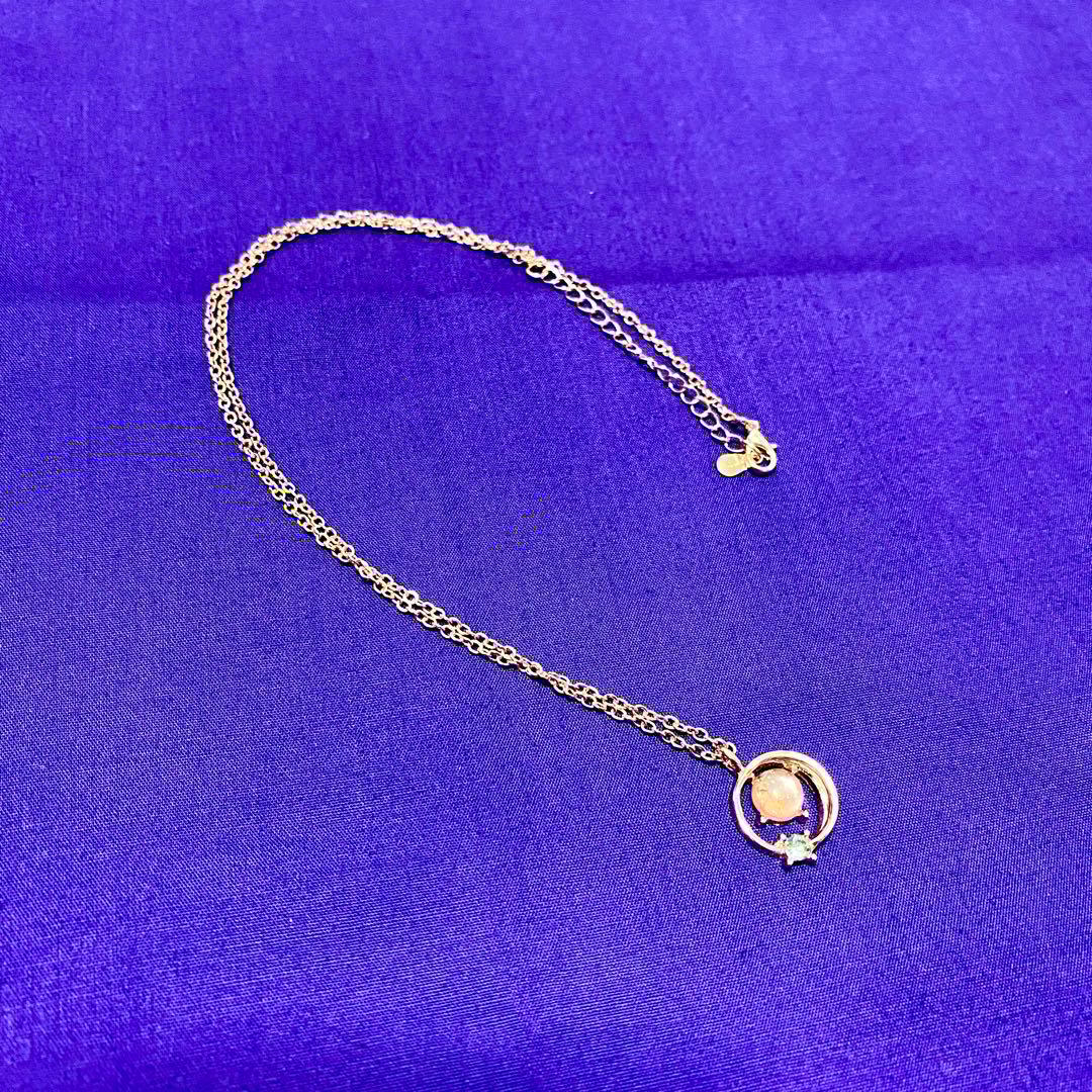 【上級呪物】聖暁環晶のペンダント ～巡る光の環が導く、運命の目覚め