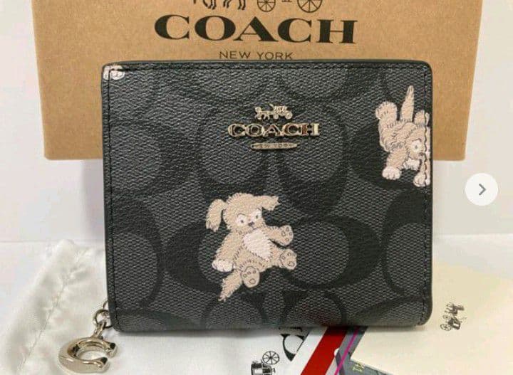 新品未使用コーチ二つ折り財布ドック犬ブラックコンパクトレディースメンズ送料無料