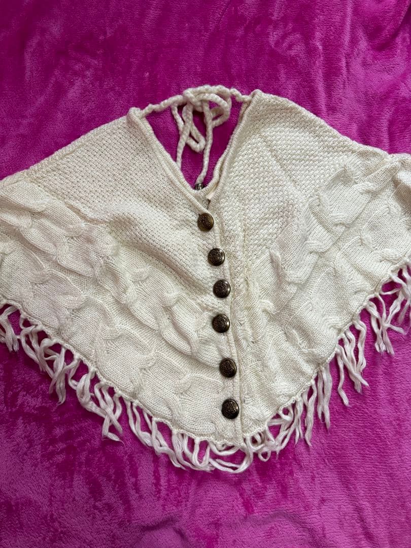 d.i.a. アイボリー ニット ケープコート フリンジ付き