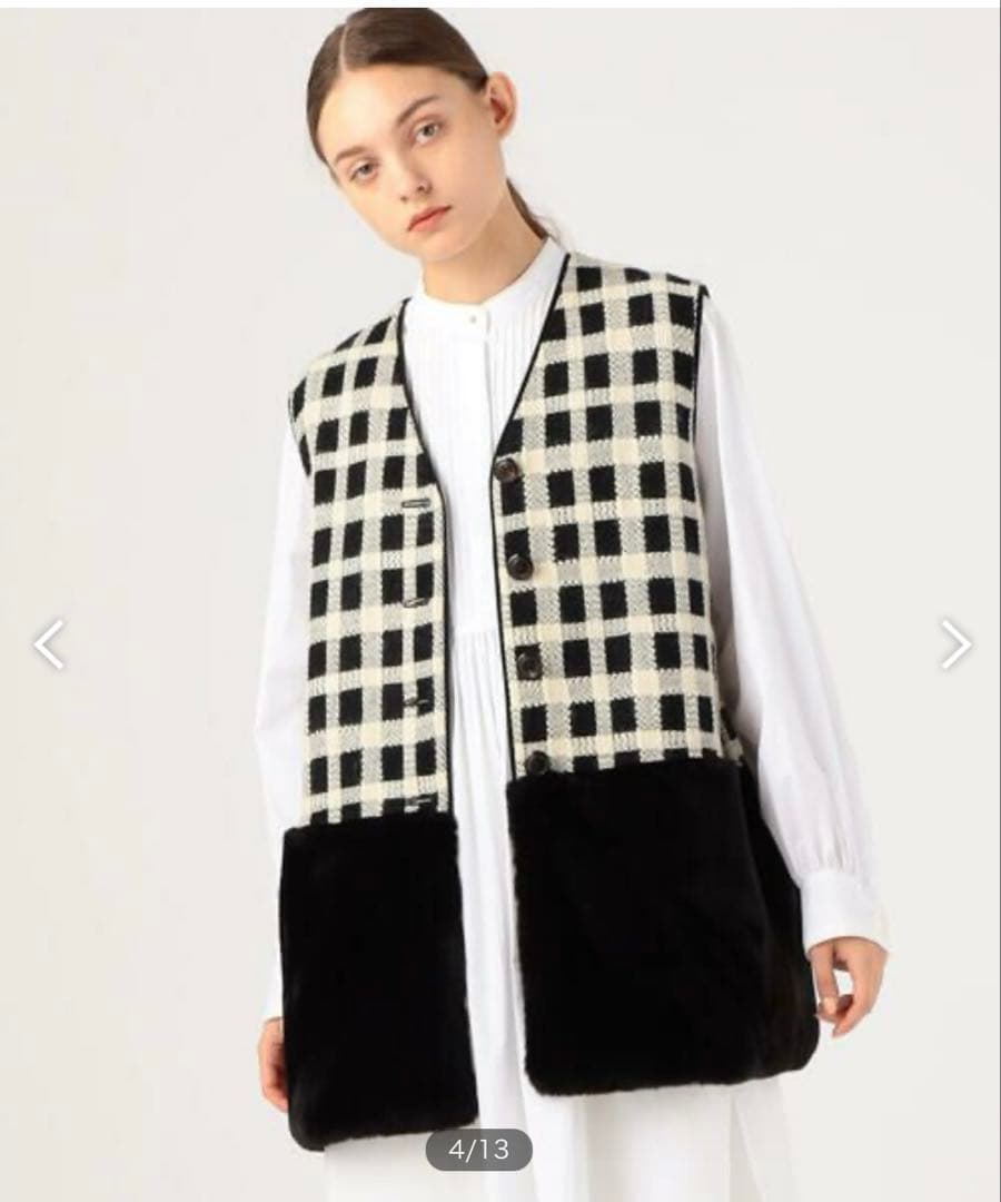 TOMORROWLAND 　タッタ—シェパード ファーペプラムジレ