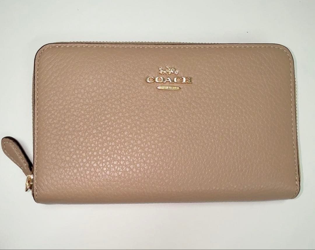 【 新品未使用 】COACH ベージュ 二つ折り財布