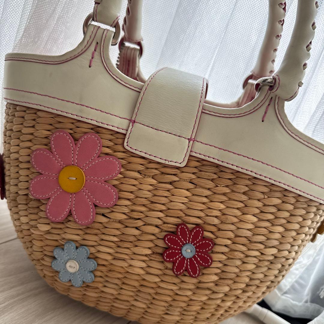 yuki 　COACH 花モチーフ付きベージュかごバッグ