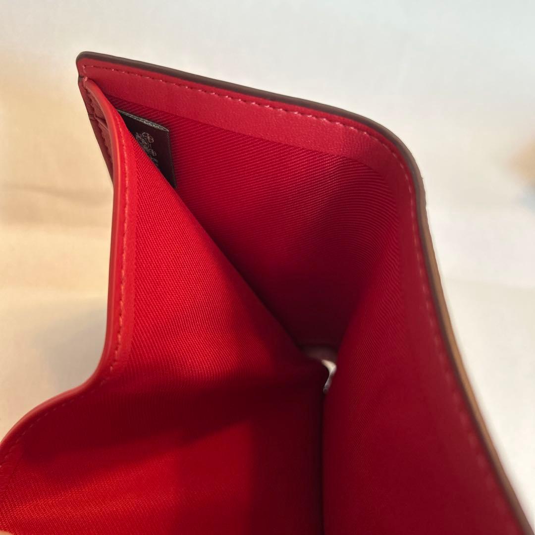 【未使用】コーチ三つ折り財布　赤×シグネチャー