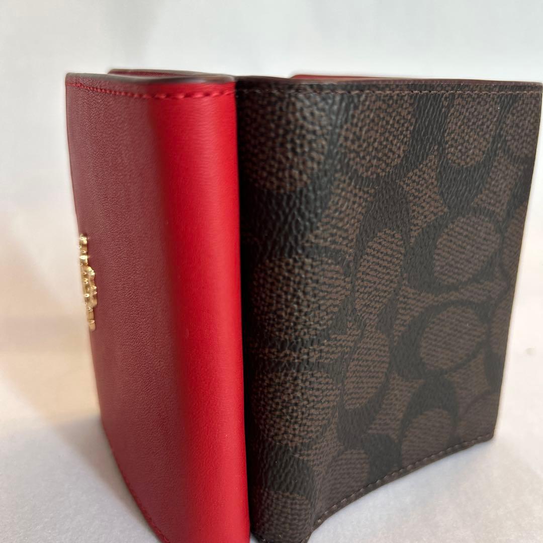 【未使用】コーチ三つ折り財布　赤×シグネチャー