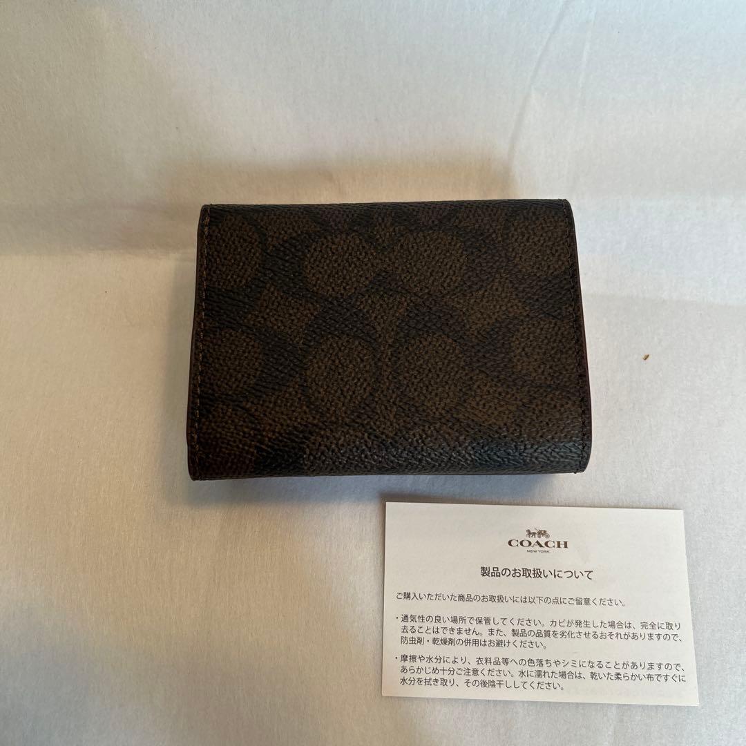 【未使用】コーチ三つ折り財布　赤×シグネチャー