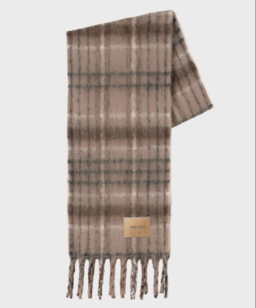 THE TOÉ Eberhard Check Muffler