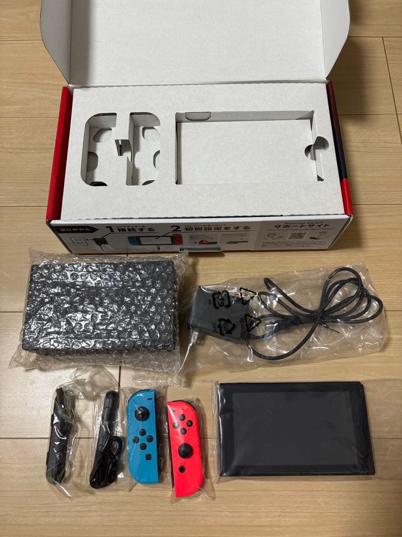 Nintendo Switch 本体　箱付き　ケースとグリップコントローラー付き