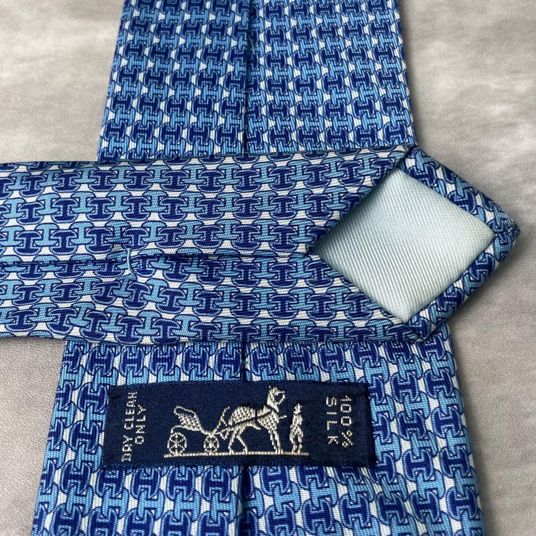 美品 HERMES エルメス H柄 総ロゴ ネクタイ ブルー 青 水色
