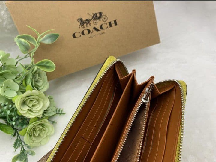 新品未使用コーチ長財布イエローシグネチャーレディースメンズ送料無料即日発送