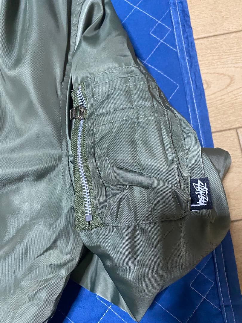 STUSSY 40周年記念 CDG × STUSSY MA-1 ジャケット