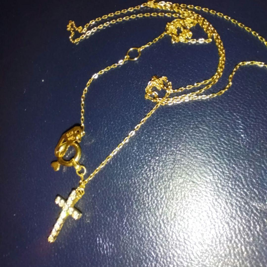 スタージュエリーK18 ダイヤクロスネックレス　マイクロセッティング0.05ct