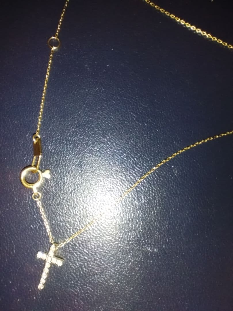 スタージュエリーK18 ダイヤクロスネックレス　マイクロセッティング0.05ct