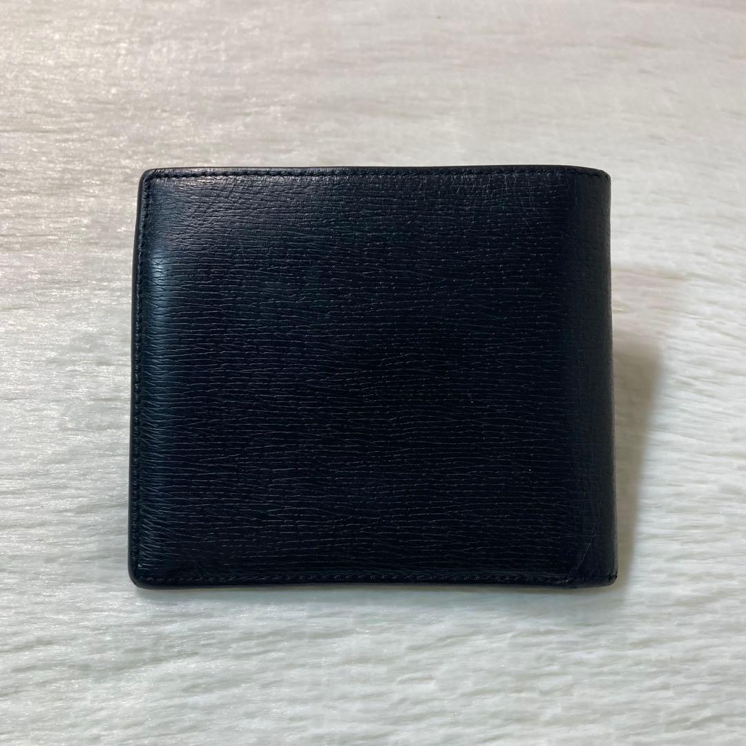 お買い得品　美品　GUCCI グッチ　二つ折り　レザー　ゴールドロゴ　人気　黒