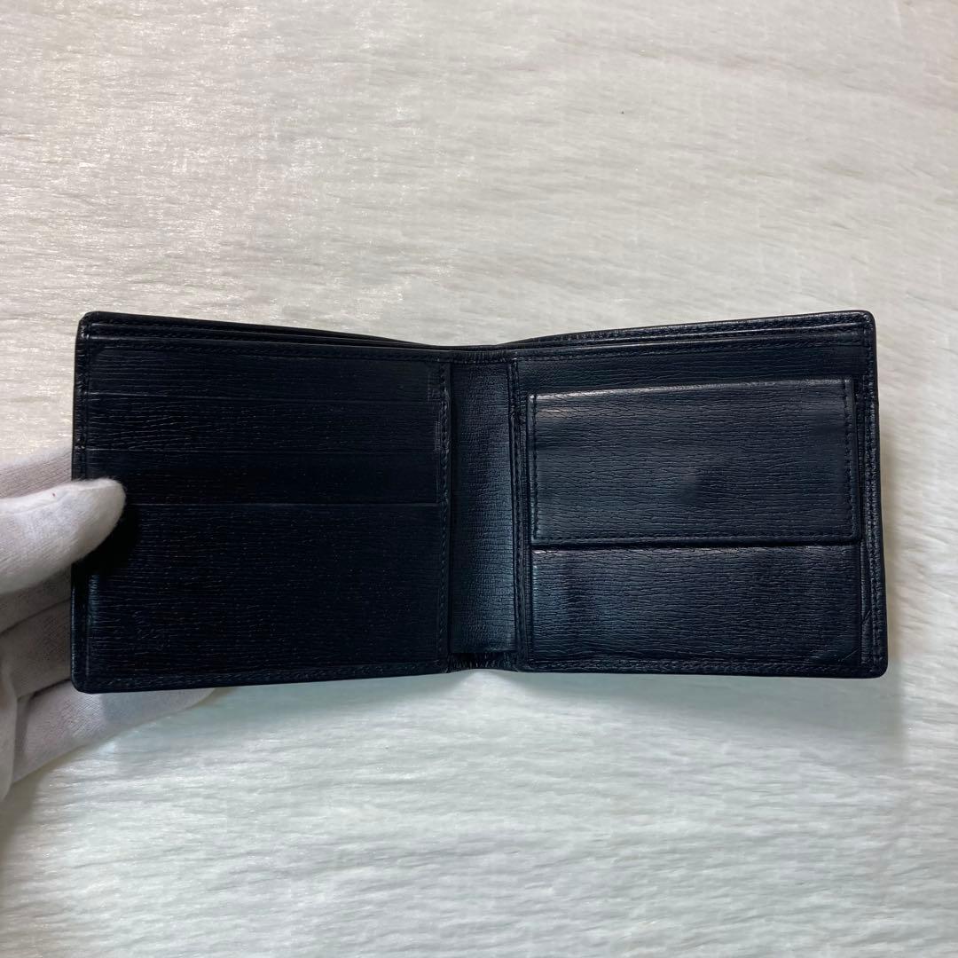 お買い得品　美品　GUCCI グッチ　二つ折り　レザー　ゴールドロゴ　人気　黒