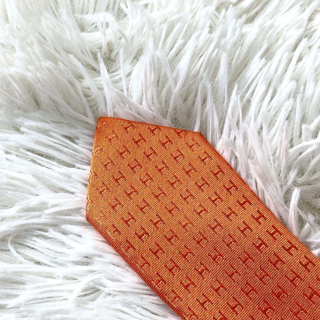 エルメス　HERMES ネクタイ　H柄　オレンジ　橙色　メンズ　ビジネス　通勤