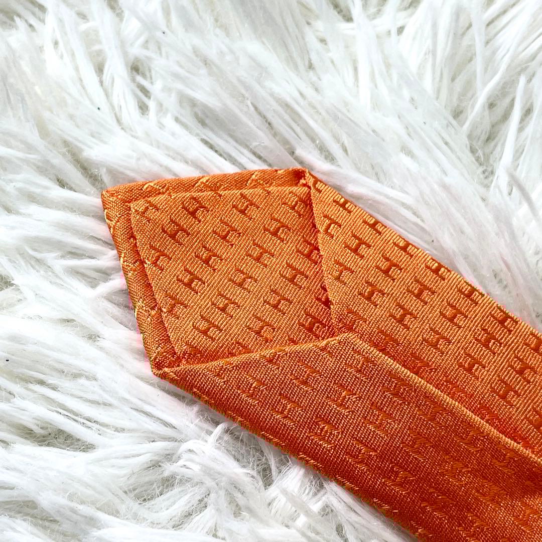 エルメス　HERMES ネクタイ　H柄　オレンジ　橙色　メンズ　ビジネス　通勤