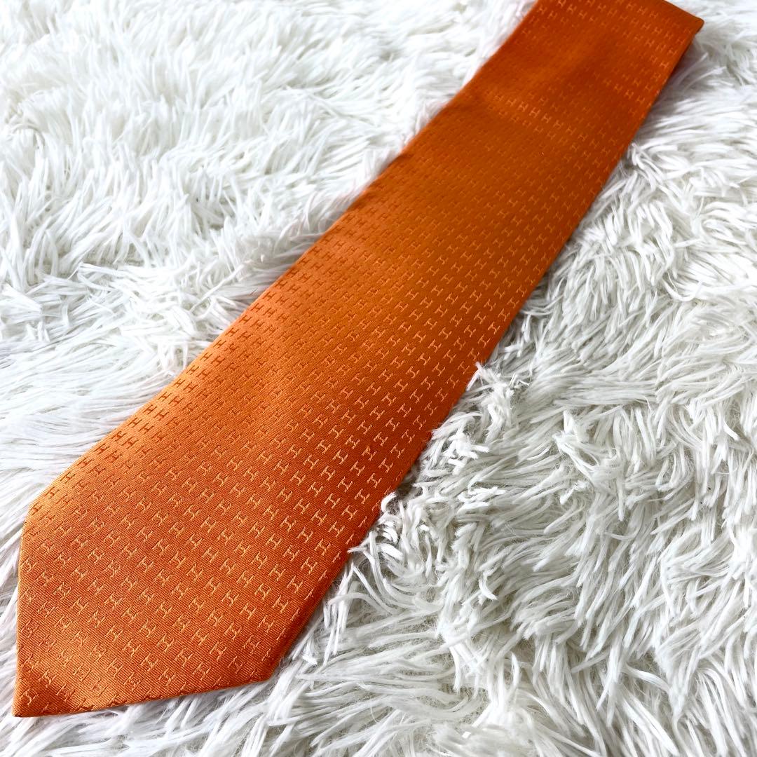 エルメス　HERMES ネクタイ　H柄　オレンジ　橙色　メンズ　ビジネス　通勤