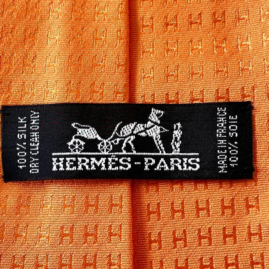 エルメス　HERMES ネクタイ　H柄　オレンジ　橙色　メンズ　ビジネス　通勤