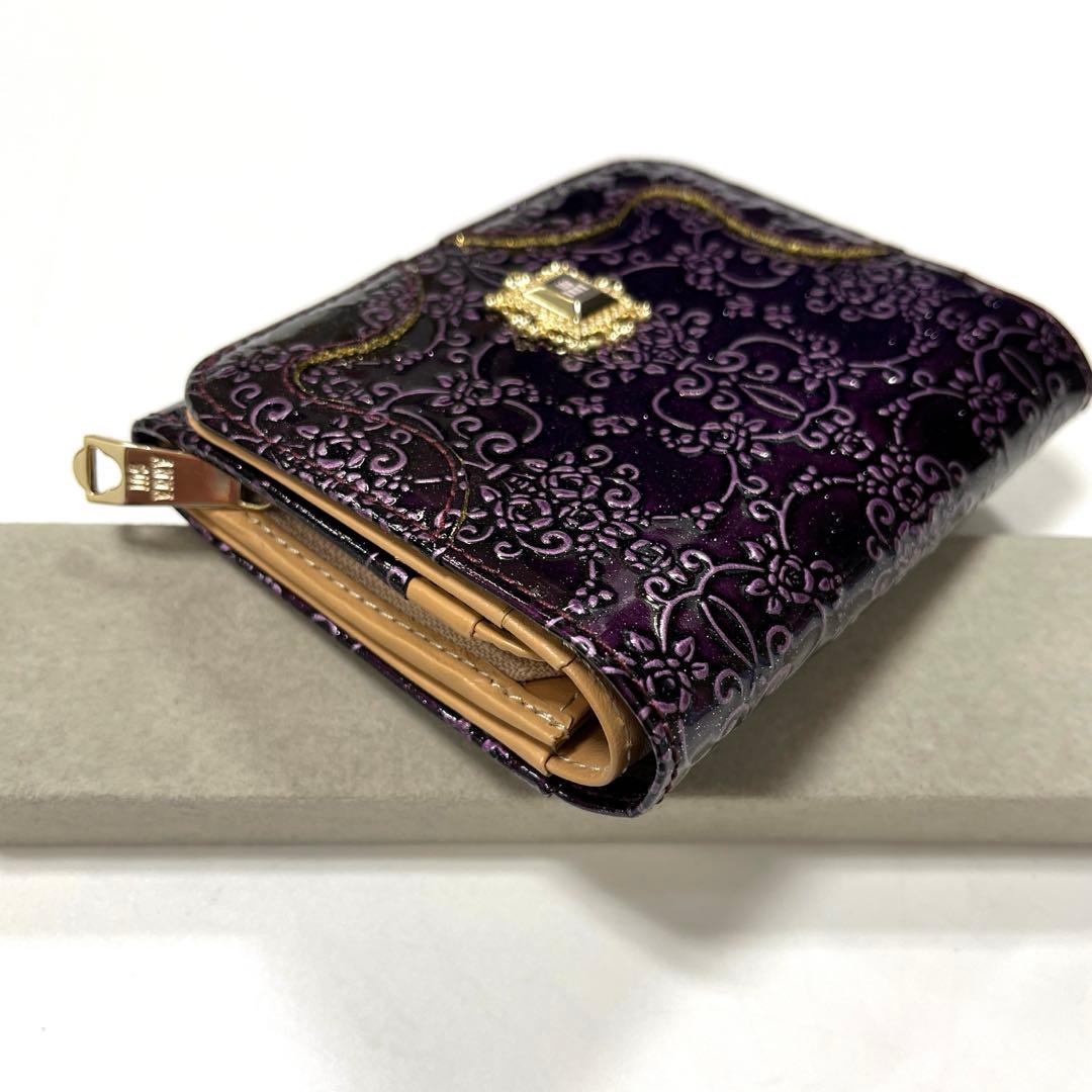 【人気モデル‼︎】ANNA SUI ルーミー　二つ折り財布　薔薇型押し　パープル