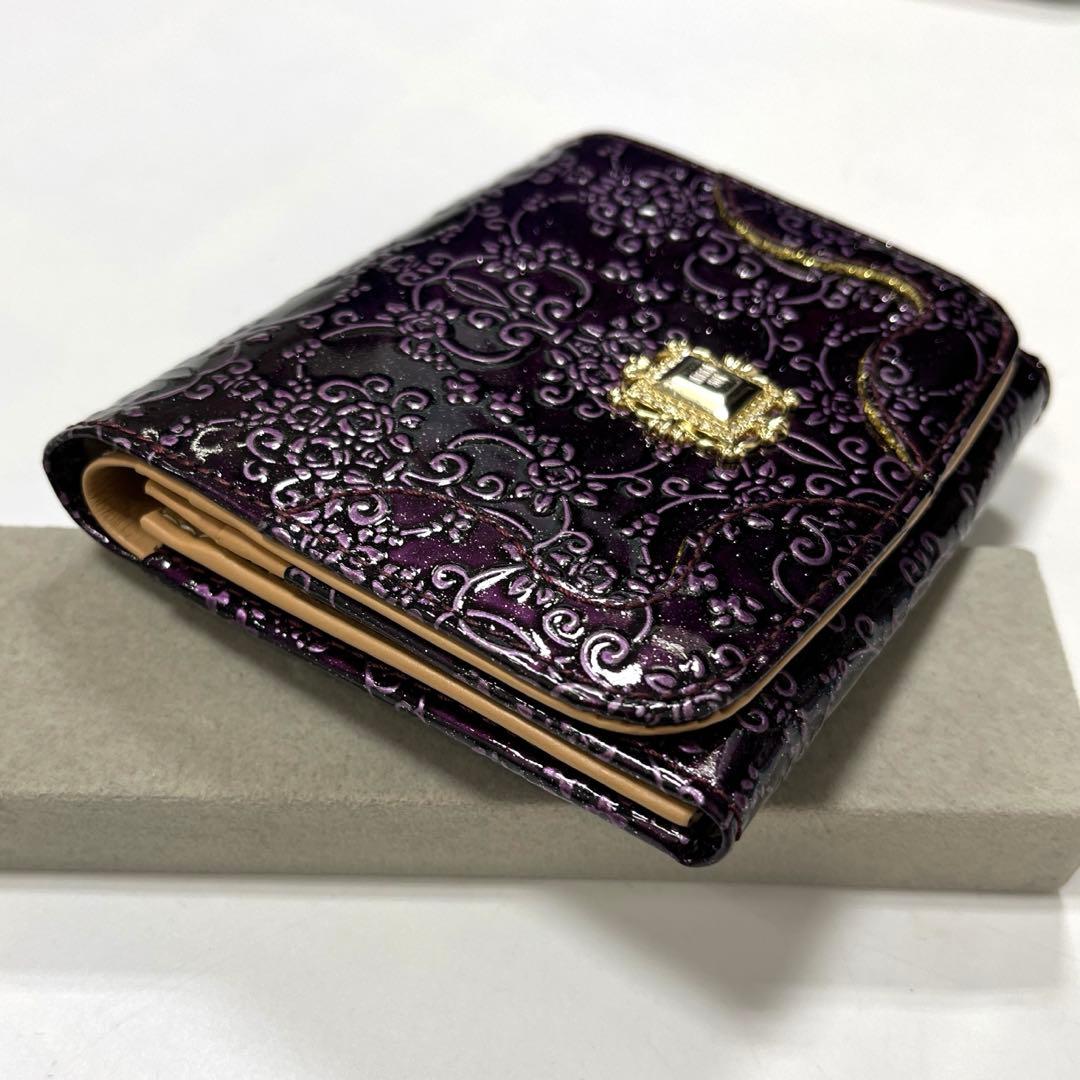 【人気モデル‼︎】ANNA SUI ルーミー　二つ折り財布　薔薇型押し　パープル