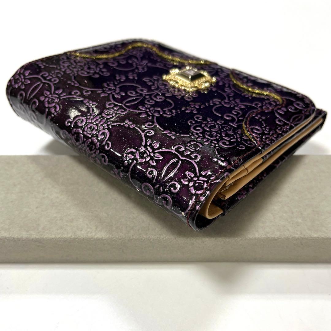 【人気モデル‼︎】ANNA SUI ルーミー　二つ折り財布　薔薇型押し　パープル