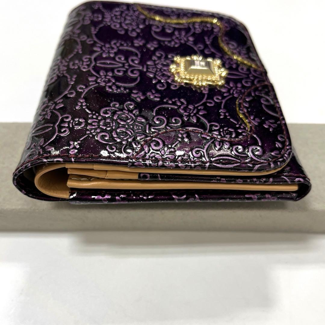 【人気モデル‼︎】ANNA SUI ルーミー　二つ折り財布　薔薇型押し　パープル