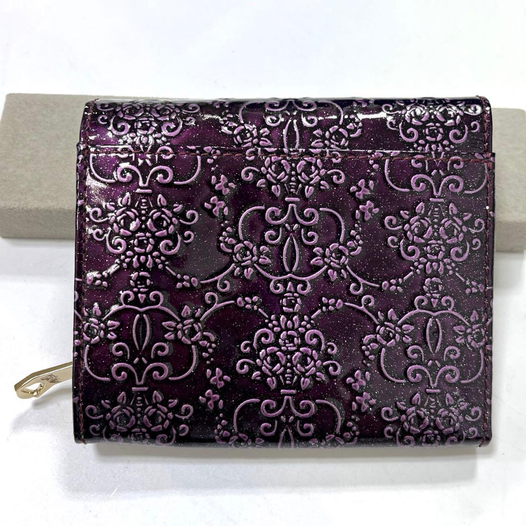 【人気モデル‼︎】ANNA SUI ルーミー　二つ折り財布　薔薇型押し　パープル