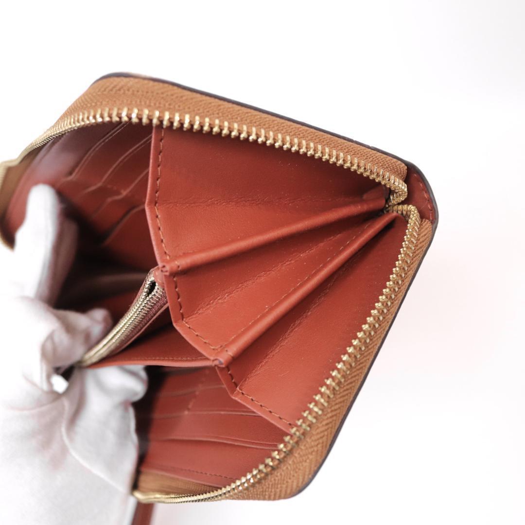 COACH ×PEANUTS　スヌーピー 長財布　シグネチャー　カーキマルチ