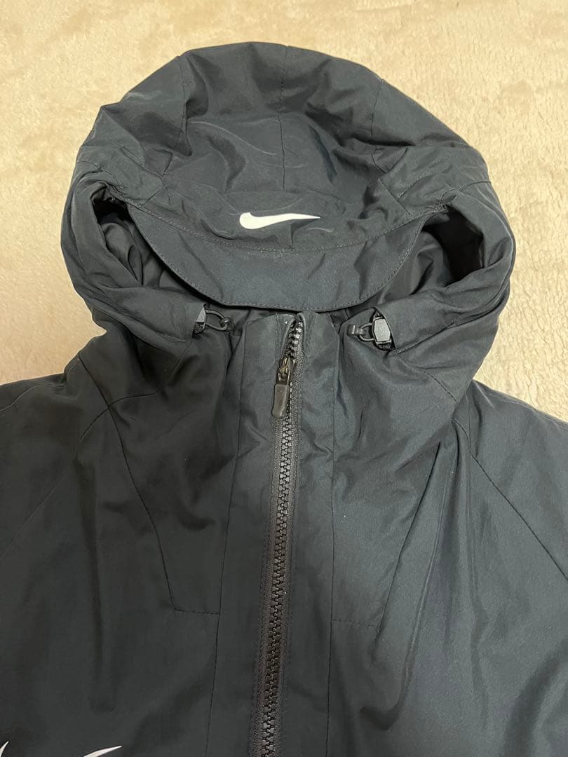 Nike ネイビーベンチコート