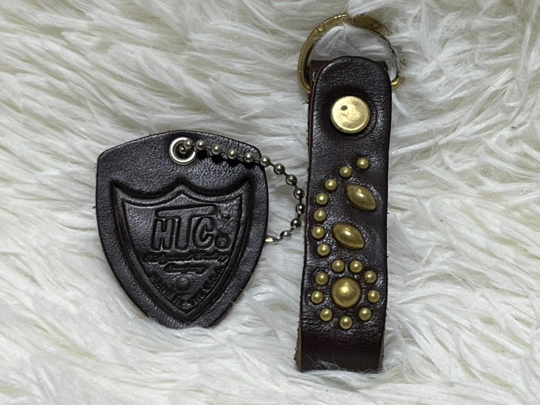 HTC ミディアムウォレット キーホルダー フラワーモチーフ ダークブラウン