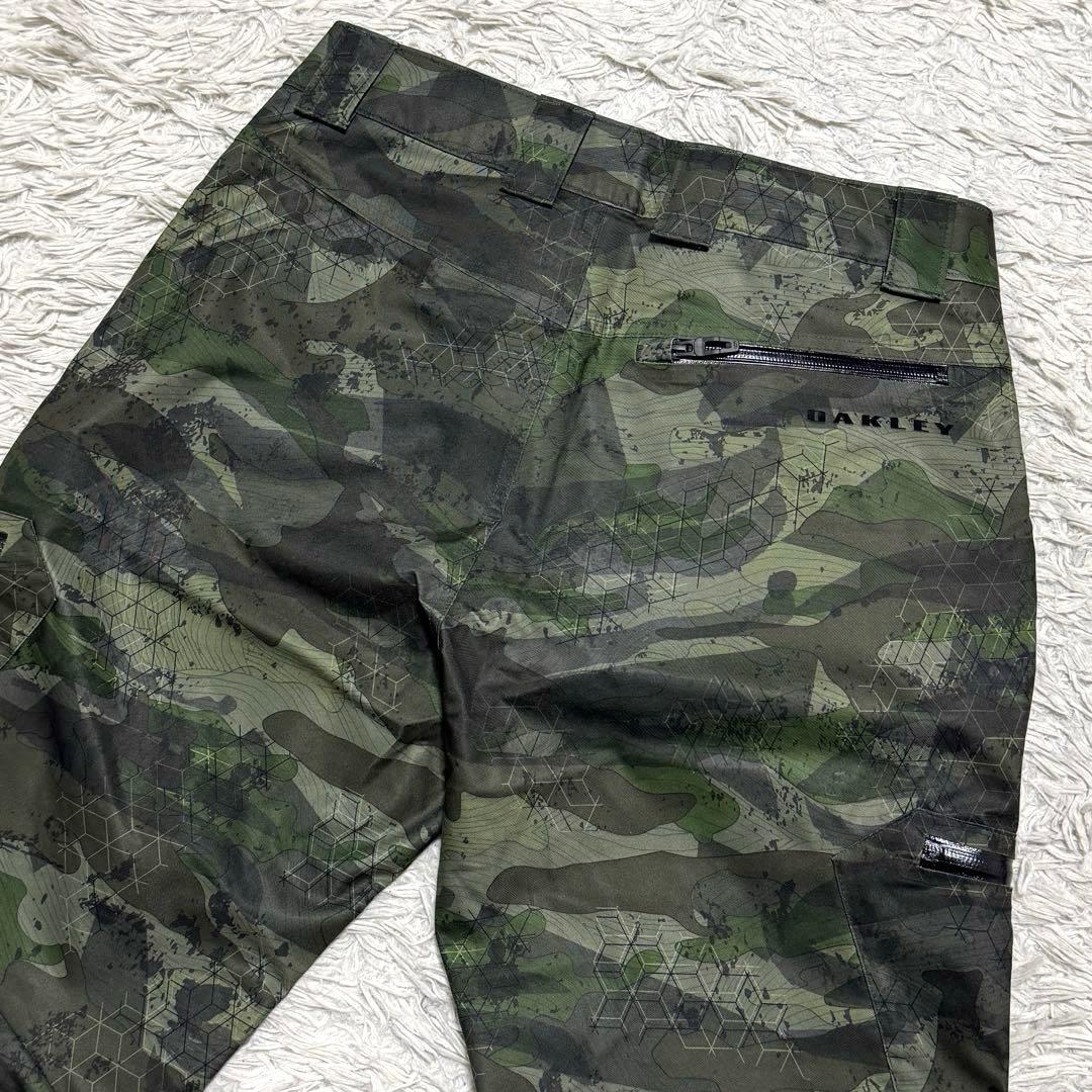 極美品 オークリー 幾何学迷彩 シェルパンツ スノーボード スキー Mサイズ