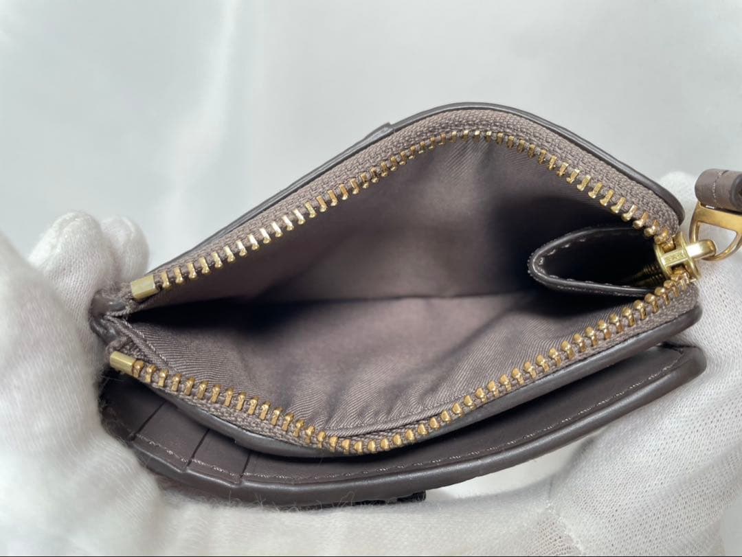 未使用に近い Tory Burch トリーバーチ 二つ折り財布 マックグロー