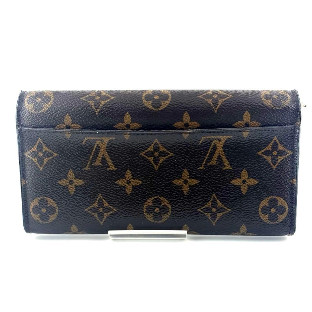 新型ポルトフォイユサラ ルイヴィトン モノグラム フューシャ 二つ折り長財布