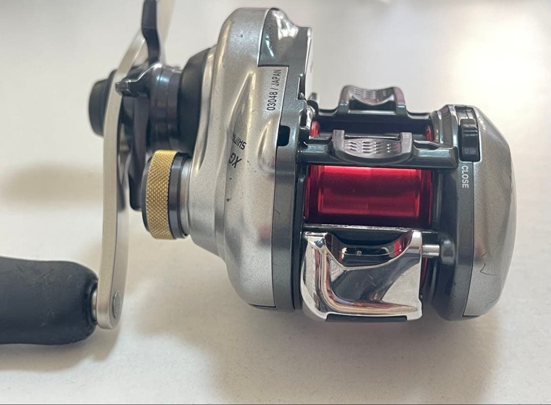 13 メタニウム XG 右ハンドル ZPI NRCスプール 他カスタム品 中古