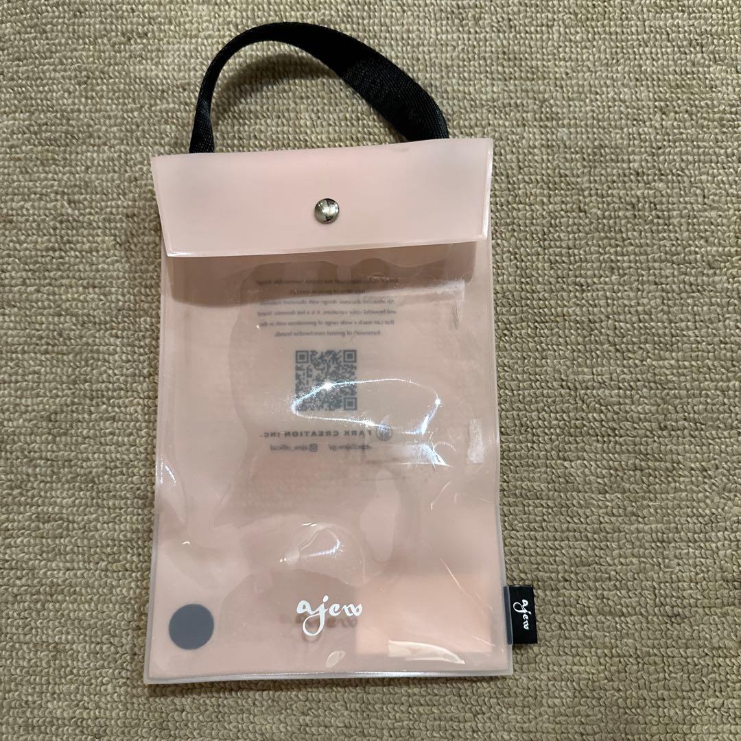 「ajew x red card」iPhone14 Pro 用スマホケース