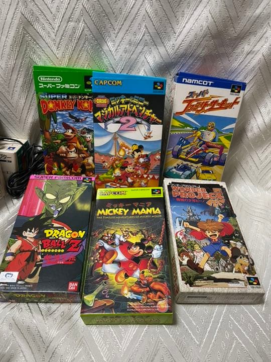 新品➕ほぼ新品　スーパーファミコン　説明書付➕ソフト６本➕ケーブル➕アダプター
