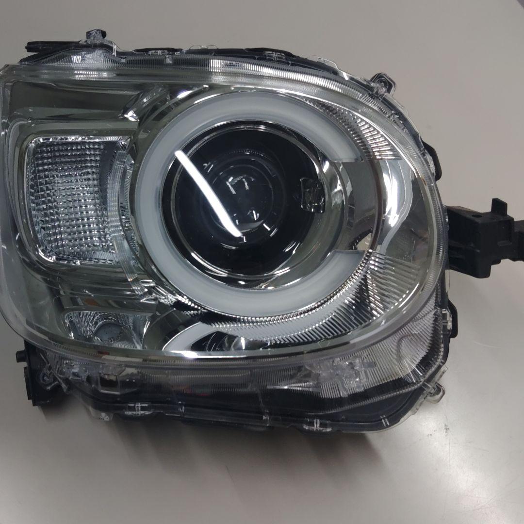 ダイハツ　ムーヴキャンバス850S右ヘッドランプ