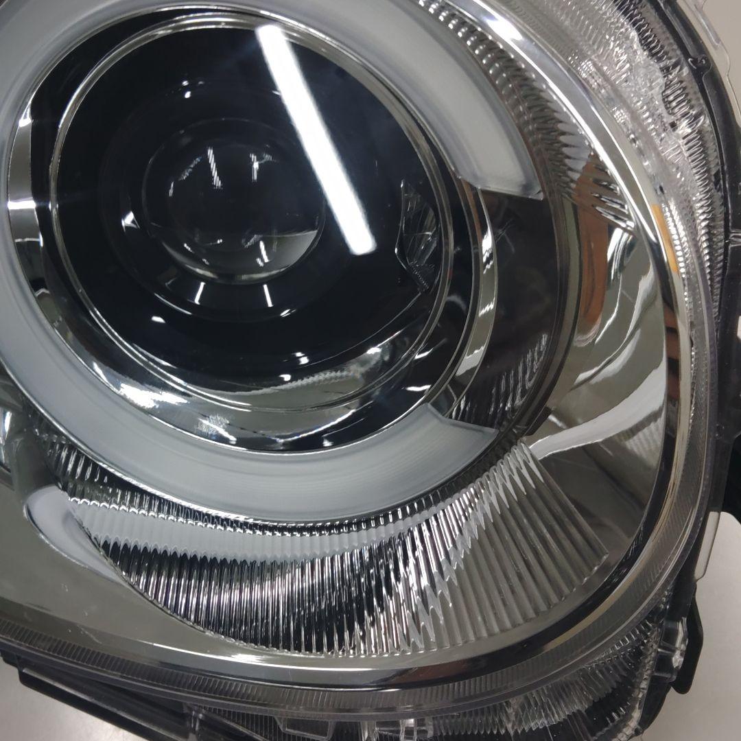 ダイハツ　ムーヴキャンバス850S右ヘッドランプ