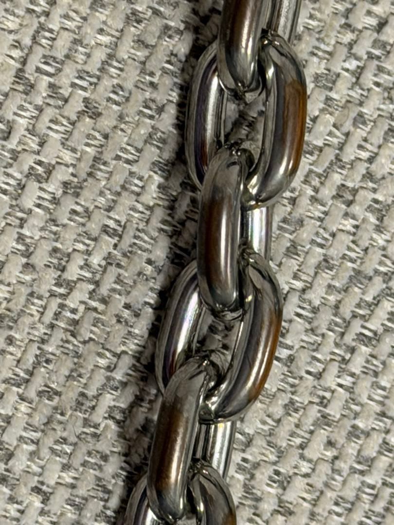 PRADA 三角ロゴプレート ヘアピン