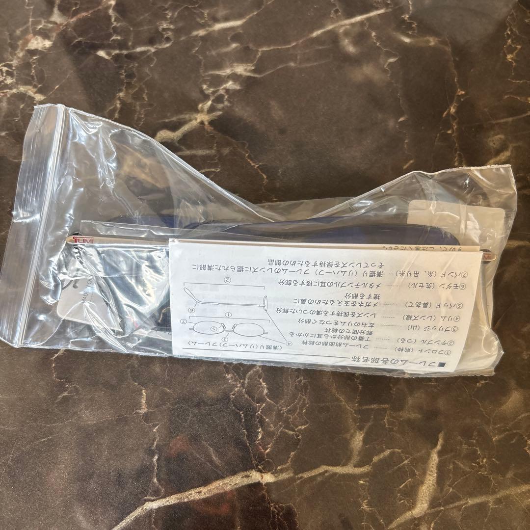 TUMI サングラス MUARI 62-15-142