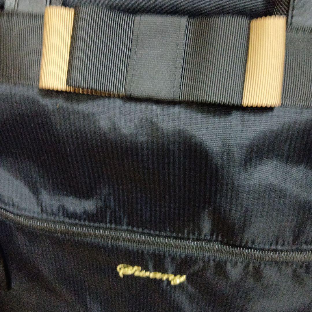 SWANY　スワニー4輪 キャリーバック　ケース 黒にリボン　ストッパー付き