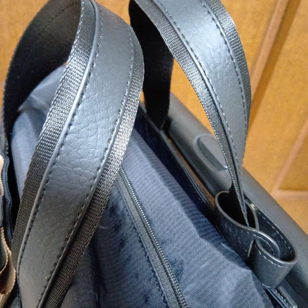 SWANY　スワニー4輪 キャリーバック　ケース 黒にリボン　ストッパー付き