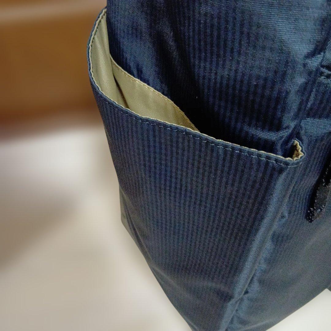 SWANY　スワニー4輪 キャリーバック　ケース 黒にリボン　ストッパー付き