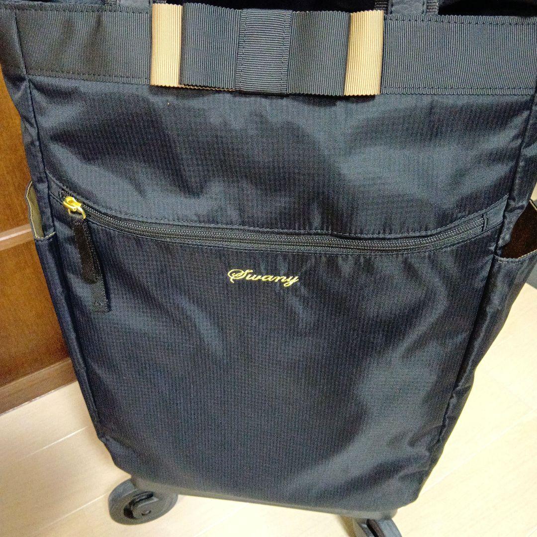 SWANY　スワニー4輪 キャリーバック　ケース 黒にリボン　ストッパー付き