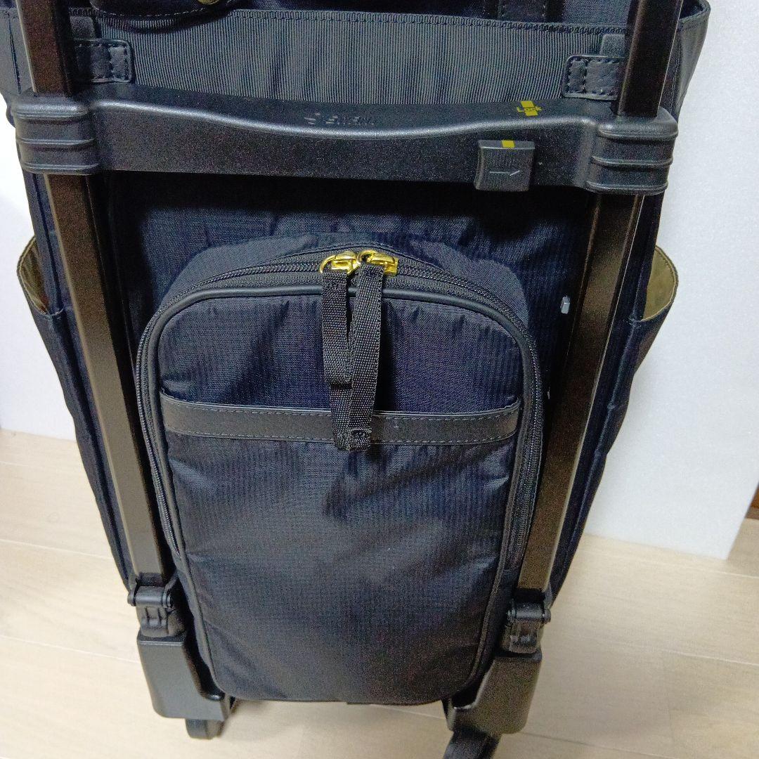 SWANY　スワニー4輪 キャリーバック　ケース 黒にリボン　ストッパー付き